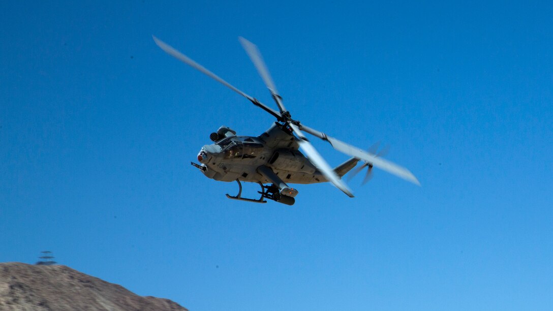 An AH-1Z Super Cobra with Marine Light Attack Helicopter Squadron flies over Range 220, the Combat Center’s largest military operations on urbanized terrain facility, Sept. 23, 2016, as part of Exercise Talon Reach. Officers awaiting training at Marine Corps Communication-Electronics School and Marine Corps Intelligence School also participated in the exercise, for the first time, to create a mutually beneficial learning environment. 