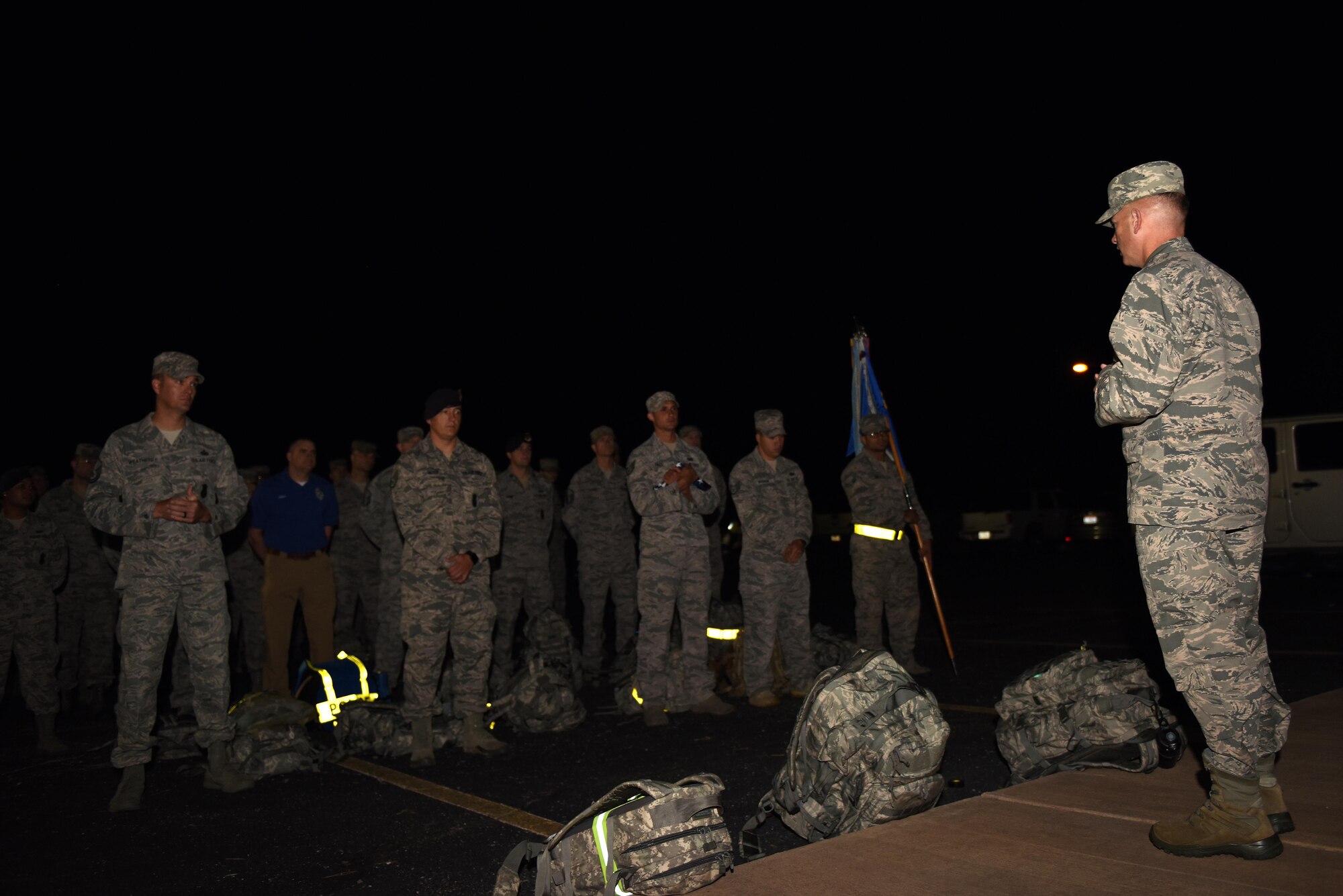 U.S. Air Force Col. Michael Downs, 17th Training Wing Commander, gives a speech to rally members of the Jacobson Memorial Ruck March at the Mathis Field Vietnam Memorial, San Angelo, Texas, Sept. 28, 2016. Members carried ruck sacks that included 25 pounds or more for a 12-mile march. (U.S. Air Force photo by Airman 1st Class Caelynn Ferguson/Released)