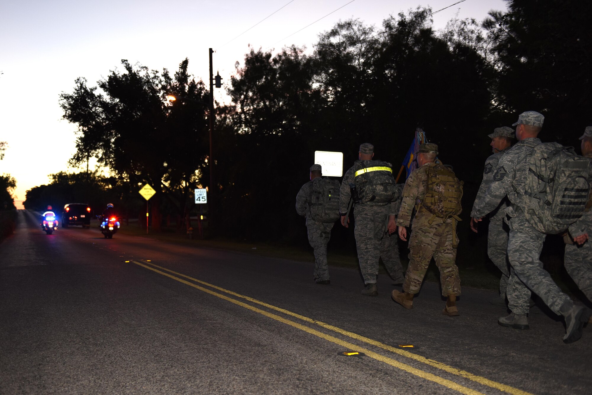 Members from Goodfellow Air Force Base participate in the Jacobson Ruck March in San Angelo, Texas, Sept. 28, 2016. Participants from various ranks, branches and squadrons marched for 12-miles to honor Airman 1st Class Elizabeth Jacobson’s memory. (U.S. Air Force photo Airman 1st Class Caelynn Ferguson/ Released)
