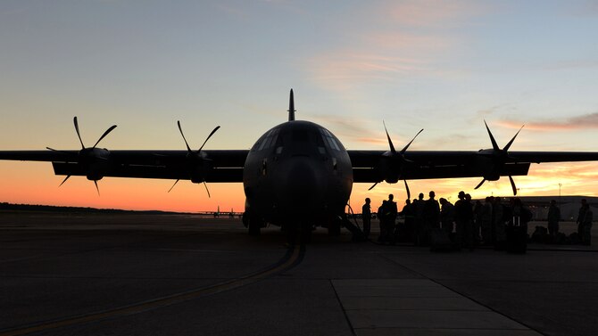Maintainers from the 19th Maintenance Group at Little Rock Air Force Base, Ark., await to board a C-130J heading to Pope Army Airfield, North Carolina, for a Joint Operational Access Exercise, Sept. 27, 2016. During the exercise, the 41st and 61st Airlift Squadrons will fly in a nine-ship formation to validate the 82nd Airborne Division as the unit to conduct a real-world forcible entry. (U.S. Air Force photo Senior Airman Mercedes Taylor) 