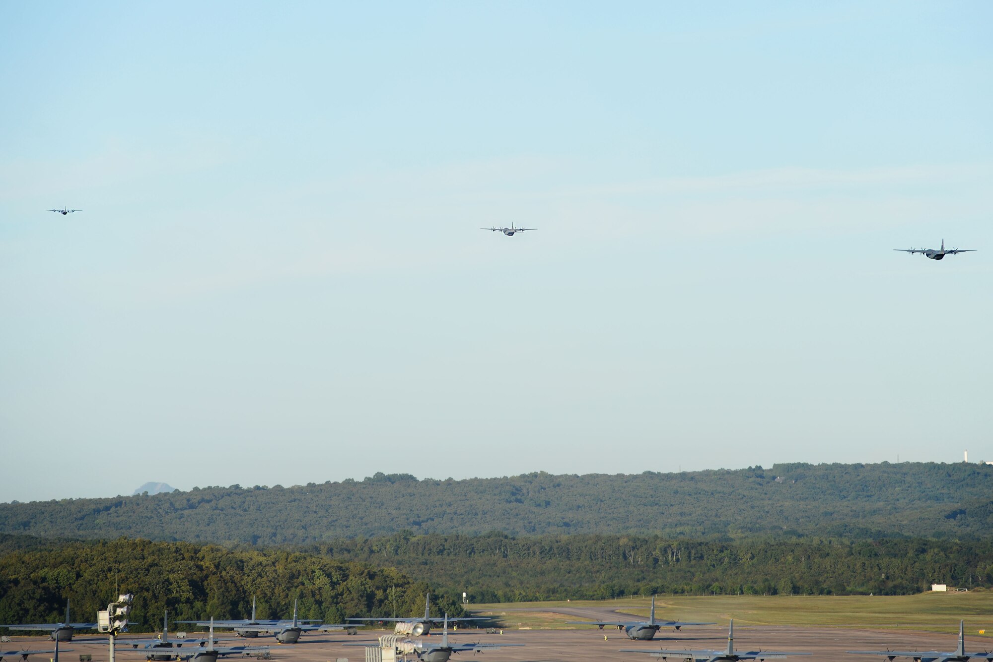 Three C-130Js depart from the 41st and 61st Airlift Squadrons to take part in a Joint Operational Access Exercise Sept. 27, 2016, at Little Rock Air Force Base, Ark. The two squadrons will contribute in validating the 82nd Airborne Division as the unit to conduct a real-world joint forcible entry. (U.S. Air Force photo Senior Airman Mercedes Taylor) 