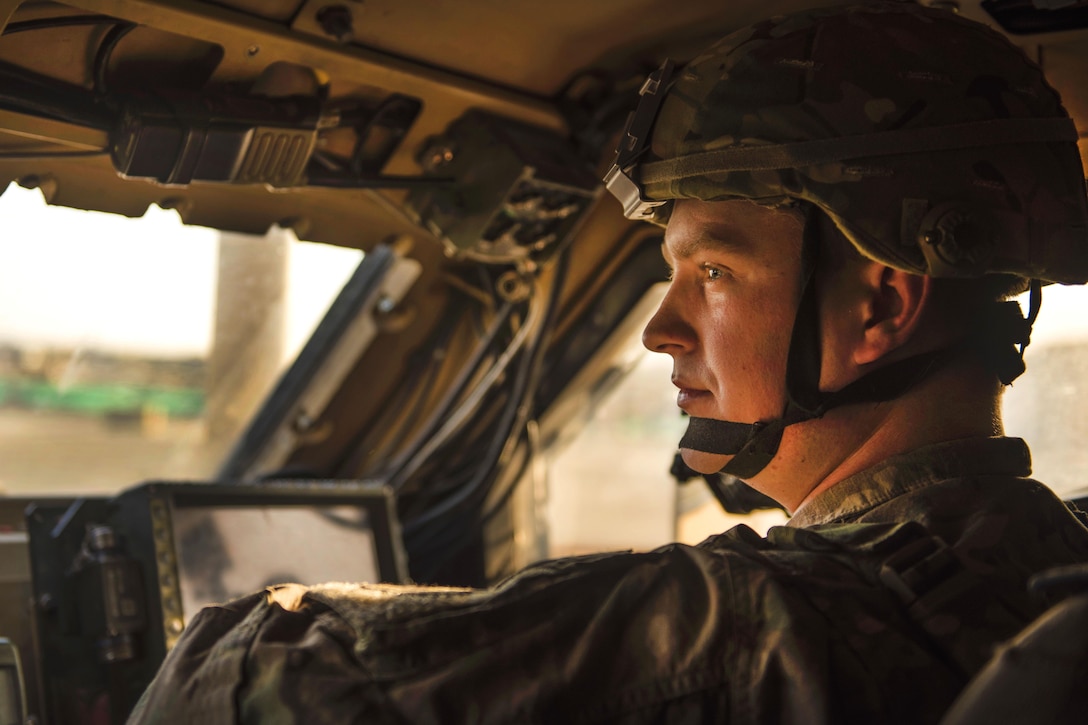 Air Force Senior Airman Michael Van Deusen patrols the flightline in a mine-resistant, ambush-protected vehicle at Bagram Airfield, Afghanistan, Sept. 27, 2016. Deusen is a quick reaction force member assigned to the 455th Expeditionary Security Forces Squadron. The vehicle has an independent suspension system to combat rocky terrain and mountainous off-road environments during combat operations. Air Force photo by Senior Airman Justyn M. Freeman