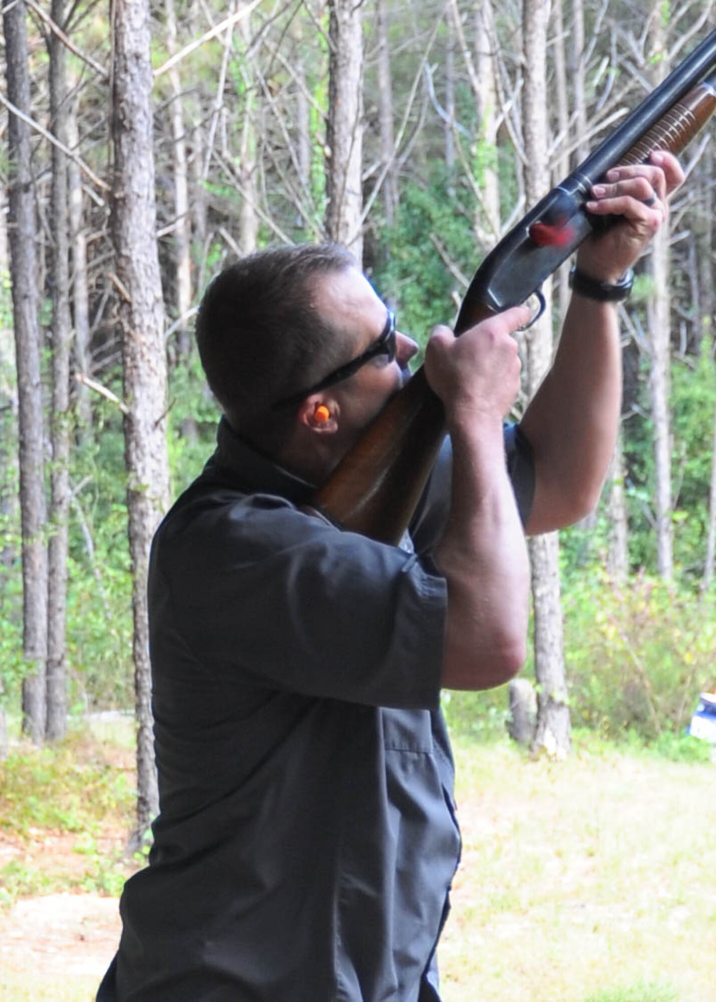 Col. Ty Neuman, 2nd Bomb Wing commander, takes aim during the Federal Bar North Louisiana Clay Pigeon Shoot in Benton, La., Sept. 23, 2016. The funds raised during the shoot will support Operation Bright Holiday so Airmen can go home for the holidays. (U.S. Air Force photo/Airman 1st Class Stuart Bright)