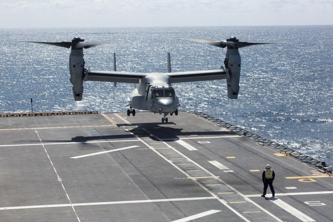 An MV-22 Osprey from Marine Medium Tiltrotor Squadron 266, Special Purpose Marine Air-Ground Task Force-Crisis Response-Africa, prepares to land on the deck of the Spanish amphibious assault ship Juan Carlos I in the Gulf of Cadiz, Spain, Sept. 14, 2016. SPMAGTF-CR-AF Marines conducted deck landing qualifications aboard the Juan Carlos I to further enhance bilateral cooperation and interoperability between the U.S. and Spain. 