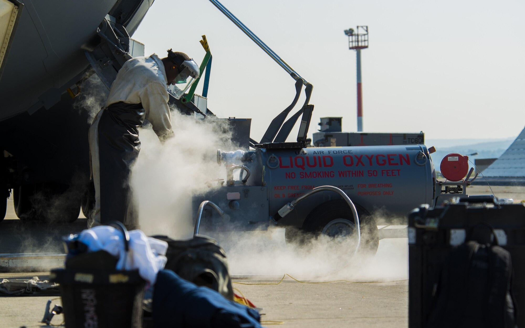 Senior Airman Christian Sharpe, 721st Aircraft Maintenance Squadron aerospace maintenance technician, refills the liquid oxygen in a C-17 Globemaster III Sept. 22, 2016 at Ramstein Air Base, Germany. Liquid oxygen is a source of breathing oxygen for pilots and aircrew at high altitudes. (U.S. Air Force photo/Senior Airman Tryphena Mayhugh)