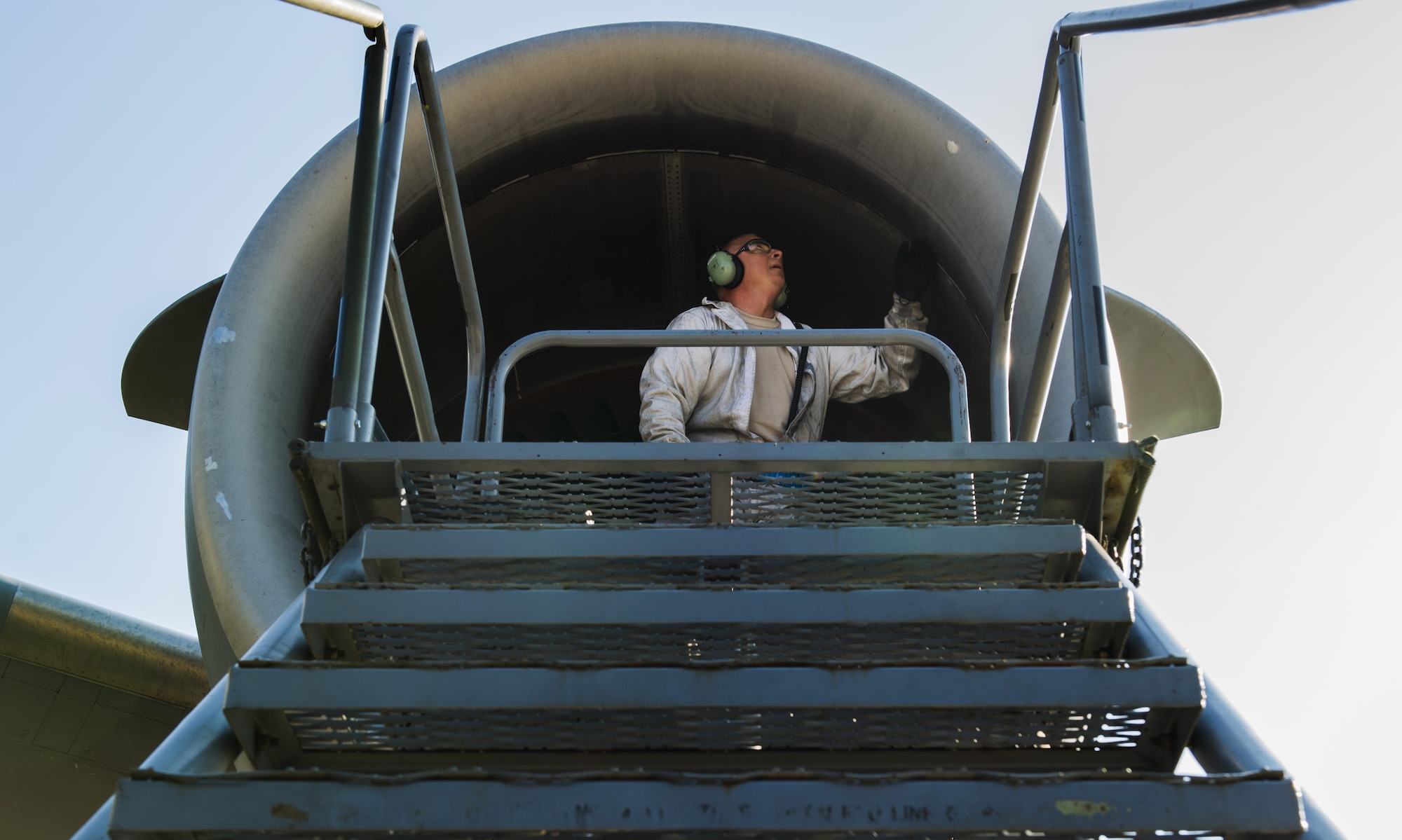 Senior Airman John Urban, 452nd Maintenance Squadron jet engine technician, inspects the engine of a C-17 Globemaster III during a routine maintenance check Sept. 22, 2016 at Ramstein Air Base, Germany. Airmen from the 452nd MXS worked with the 721st Aircraft Maintenance Squadron while at Ramstein for a temporary duty. Routine inspections of aircraft ensure the safety of the crew and allow the mission to continue. (U.S. Air Force photo/Senior Airman Tryphena Mayhugh)