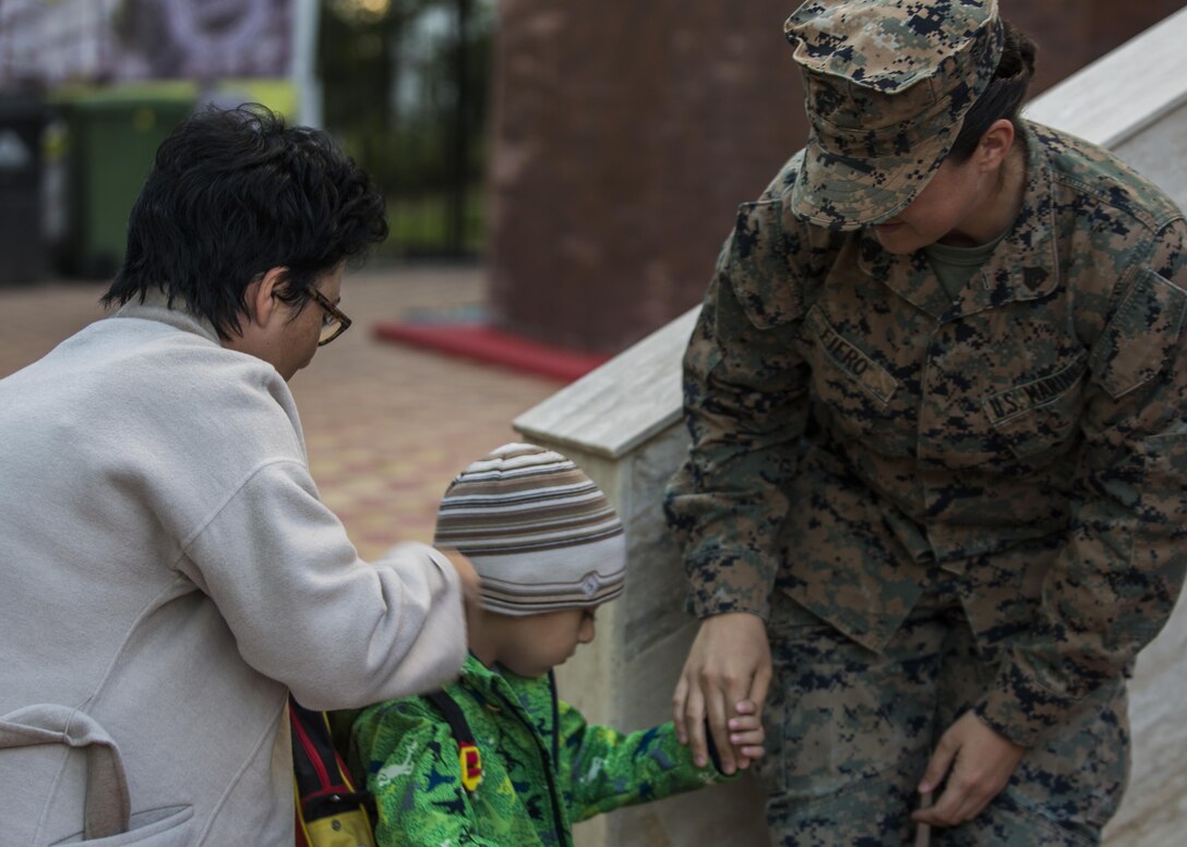 Women with a U.S. Marine Female Engagement Team operating in Europe interact with students at the Cambridge School of Constanta, Romania, 28 Sept., 2016.  The Marines spent two weeks doing military-to-military and military-to-civilian engagements to enhance regional security and stability. (U.S. Marine Corps photo by Sgt. Michelle Reif)