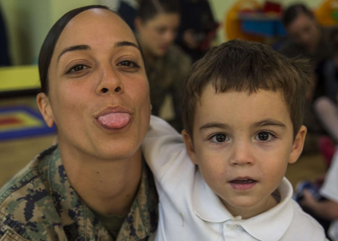 Women with a U.S. Marine Female Engagement Team operating in Europe interact with students at the Cambridge School of Constanta, Romania, 28 Sept., 2016.  The Marines spent two weeks doing military-to-military and military-to-civilian engagements to enhance regional security and stability. (U.S. Marine Corps photo by Sgt. Michelle Reif)