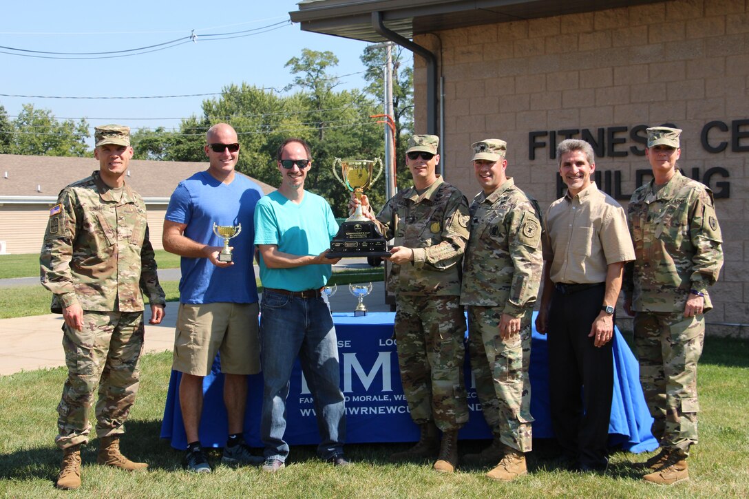 The top civilian team of the 2016 Commander’s Cup, Team 3-Peat, receives their trophy with installation commander Army Col. Brad Eungard, far left, senior enlisted advisor 1st Sgt. Janine Burr, far right, and DLA Susquehanna site director Rob Montefour, second from right.