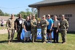 The 2016 Commander’s Cup top military team, Team Cold Steele, receives their trophy with installation commander Army Col. Brad Eungard, far left, senior enlisted advisor 1st Sgt. Janine Burr, far right, and DLA Susquehanna site director Rob Montefour, second from right.