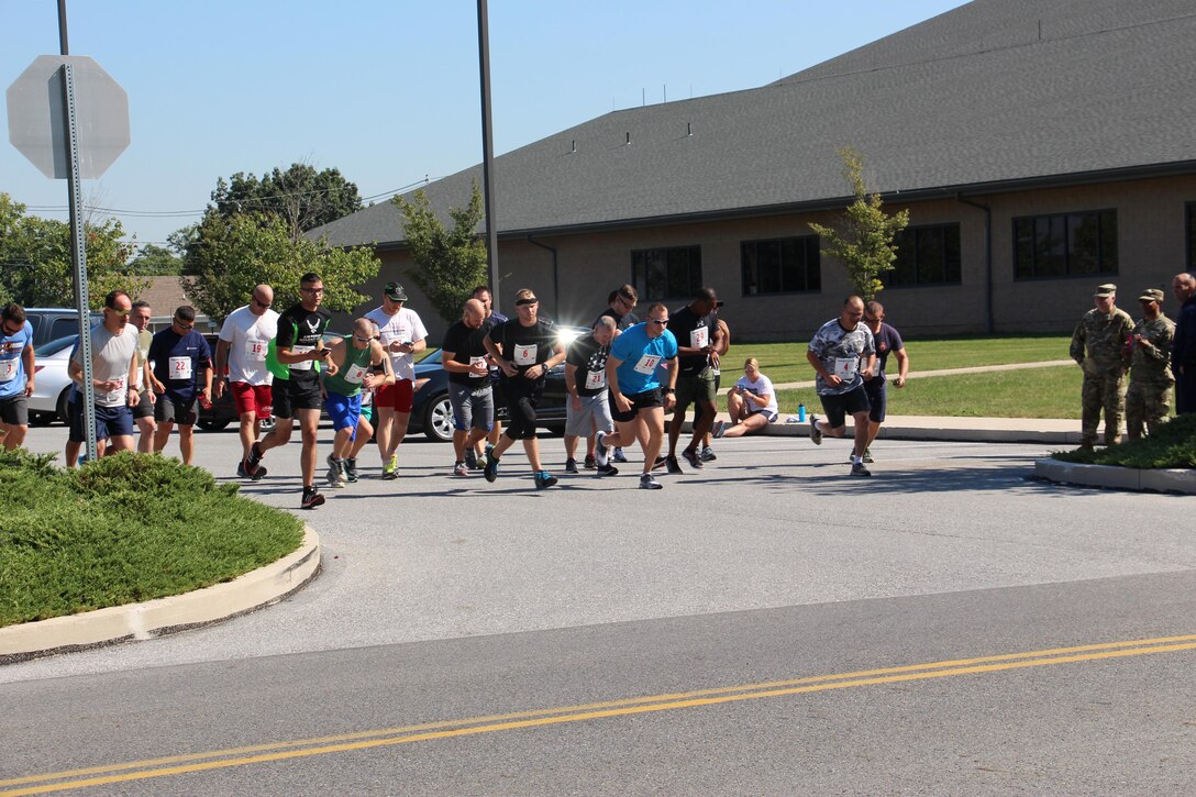 Runners take off for the Commander’s Cup grand finale 10K.