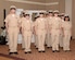 Chief Petty Officers stand in formation during a promotion ceremony September 16, 2016. Fifteen Sailors from various units in South Carolina were presented with their new rank in a traditional ceremony at the Red Bank Club on Joint Base Charleston-Naval Weapons Station.