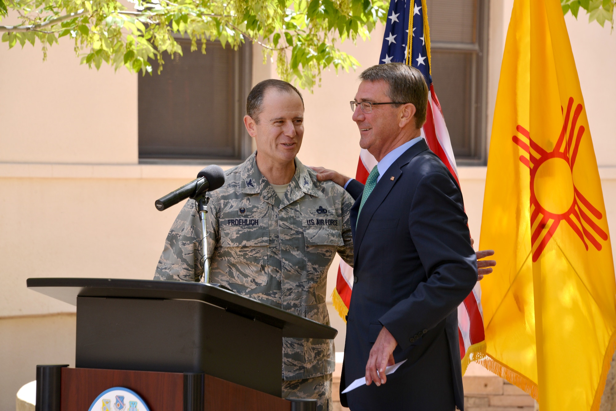 Col. Eric Froehlich, 377th Air Base Wing commander, greets U.S. Secretary of Defense Ash Carter during a visit to Kirtland Sept. 27.  Carter spoke to Airmen, emphasizing the importance of the nuclear enterprise and thanked the Airmen for their work in helping build a strong nuclear deterrent. 