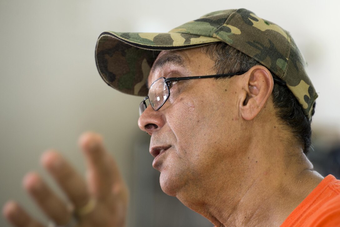 Vietnam veteran Army Sgt. Jorge Zambrana speaks about his military experiences during an interview in Cabo Rojo, Puerto Rico, Aug. 10, 2016. DoD photo by EJ Hersom
