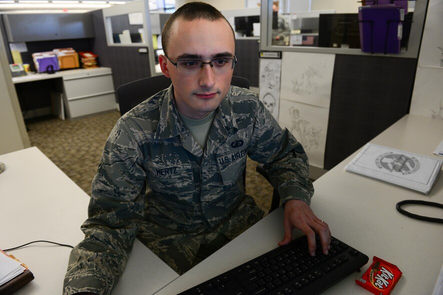 Airman 1st Class Anthony Mertz, 2nd Contracting Squadron contract specialist, drafts a contract at Barksdale Air Force Base, La., Sept. 28, 2016. With the end of the fiscal year, the 2nd CONS was busy drafting contracts and allocating funds for Barksdale. (U.S. Air Force photo/Senior Airman Luke Hill)