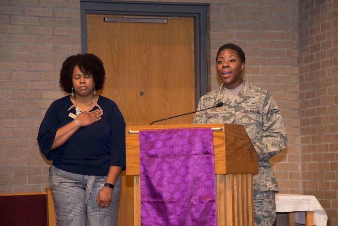 Air Force Senior Airman Khadija Slaughter performs the National Anthem at the inaugural "Bells Across America" ceremony at All Saints Chapel on Joint Base Charleston-Naval Weapons Station September 22, 2016. Bells Across America is a ceremony that honors fallen servicemembers and is held each year on military installations around the world in conjunction with Gold Star Mothers and Families' Day.