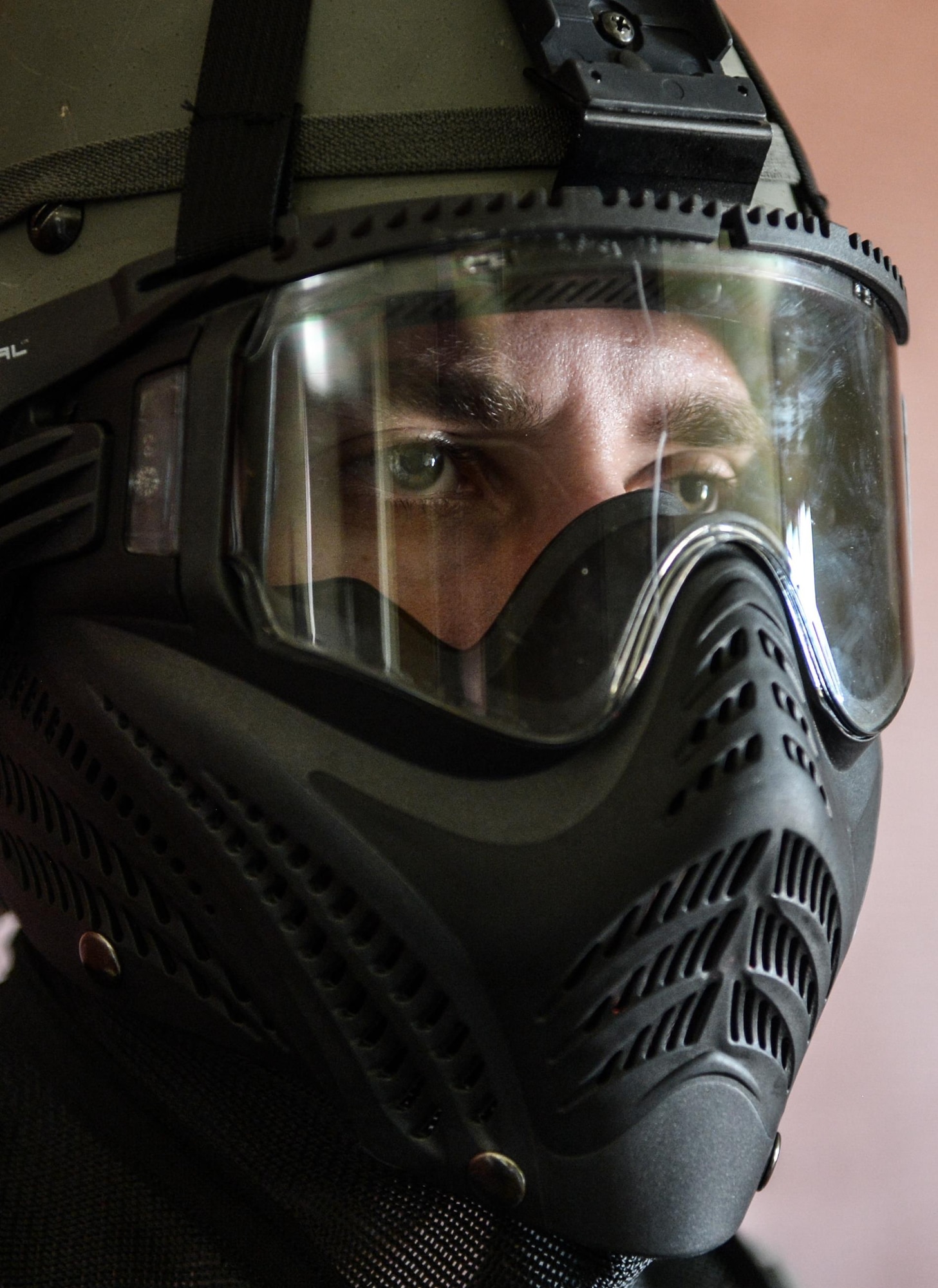 Senior Airman Kyle Harper, 2nd Security Forces Squadron entry controller, prepares for an active shooter exercise at Barksdale Air Force Base, La., July 18, 2016. During the training, defenders clear a building room by room, looking for the shooter. Once the shooter has been located and neutralized, the team does a second building sweep to make sure no threats remain. (U.S. Air Force photo/Senior Airman Curt Beach)