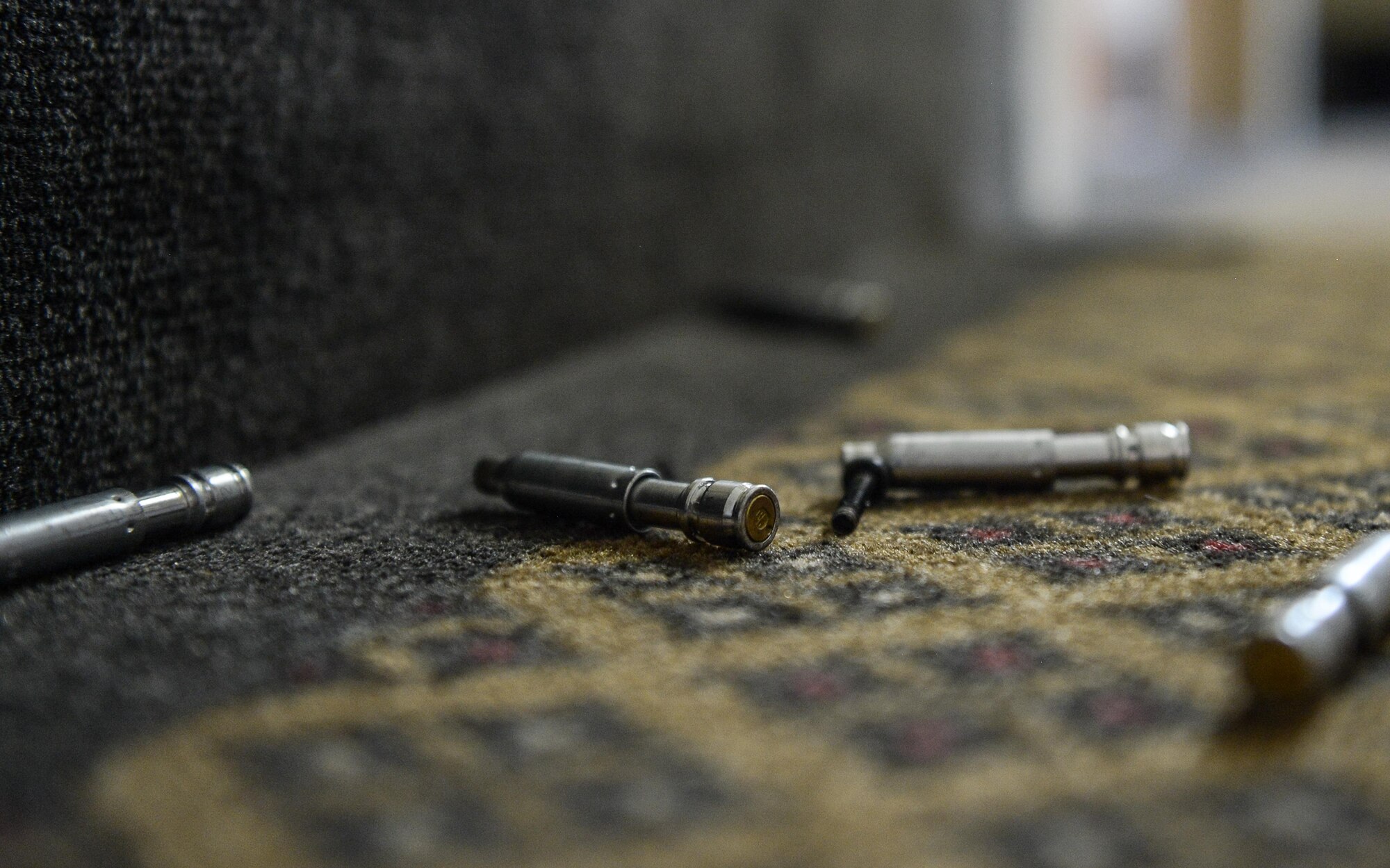 Simulated rounds lie on the ground at Barksdale Air Force Base, La., July 18, 2016. Defenders from the 2nd Security Forces Squadron worked in two-person teams to clear rooms during an active shooter training exercise. (U.S. Air Force photo/Senior Airman Curt Beach)