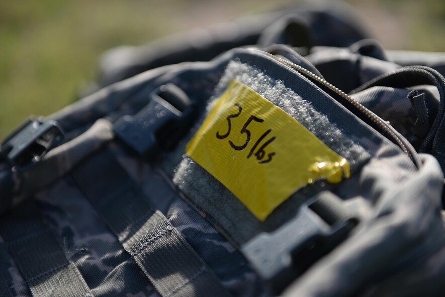 A ruck sack awaits a carrier during the POW/MIA memorial ruck march on Laughlin Air Force Base, Texas, Sept. 15, 2016. Participants in the 24-hour ruck march walked, ran and rucked in honor of those missing or captured during battle. (U.S. Air Force photo/ Airman 1st Class Benjamin N. Valmoja)