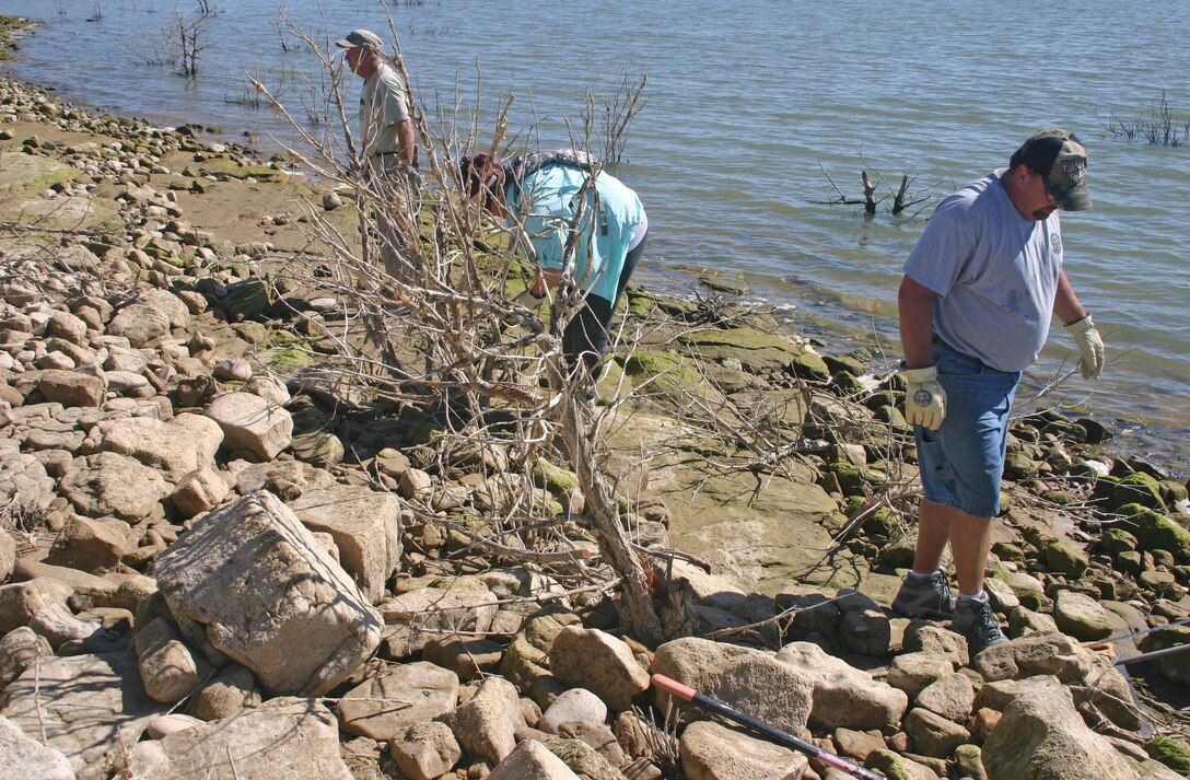 JOHN MARTIN RESERVOIR, Colo., -- Volunteers work to remove invasive trees on National Public Lands Day, Sept. 24, 2016. The work improved nesting habitat for the endangered interior least tern and threatened piping plover birds which like to nest at the reservoir. 