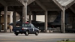 A U.S. Air Force 18th Security Forces Squadron patrol vehicle guards F-15 Eagle fighter aircraft parked on the flightline Sept. 27, 2016, at Kadena Air Base, Japan. Response force members of the 18th SFS guard Kadena’s aircraft and watch for unauthorized activity or personnel both day and night, ensuring uninterrupted aircraft operations.  