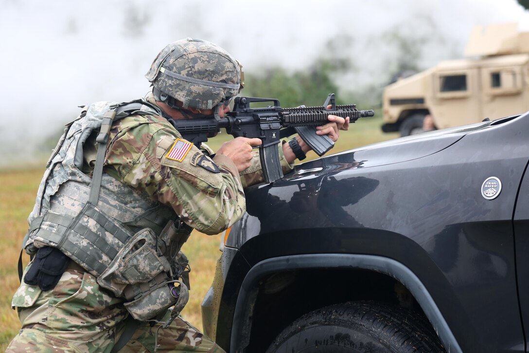 U.S. Army Sgt. 1st Class, Joshua Moeller, assigned to U.S. Army Reserve Command, demonstrates his marksmanship and tatical combat casualty care capabilities during a live-fire exercise on Day Three of the U.S. Army 2016 Best Warrior Competition (BWC) at Fort A.P. Hill, Va., Sept. 28, 2016. The BWC is an annual weeklong event that will test 20 Soldiers from the 10 major commands Army-wide, on their physical and mental capabilities. The top NCO and Soldier will be announced Oct. 3, in Washington DC. (U.S. Army photo by Spc. Michel'le Stokes).