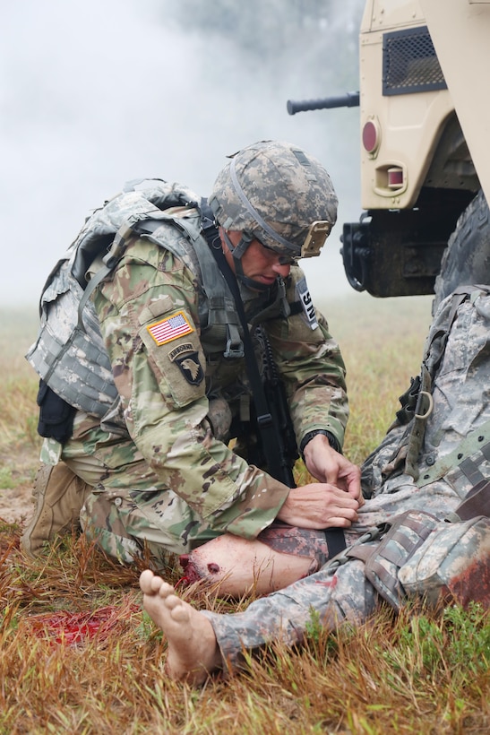 U.S. Army Sgt. 1st Class, Joshua Moeller, assigned to U.S. Army Reserve Command, demonstrates his marksmanship and tactical combat casualty care capabilities during a live-fire exercise on Day Three of the U.S. Army 2016 Best Warrior Competition (BWC) at Fort A.P. Hill, Va., Sept. 28, 2016. The BWC is an annual weeklong event that will test 20 Soldiers from the 10 major commands Army-wide, on their physical and mental capabilities. The top NCO and Soldier will be announced Oct. 3, in Washington DC. (U.S. Army photo by Spc. Michel'le Stokes).