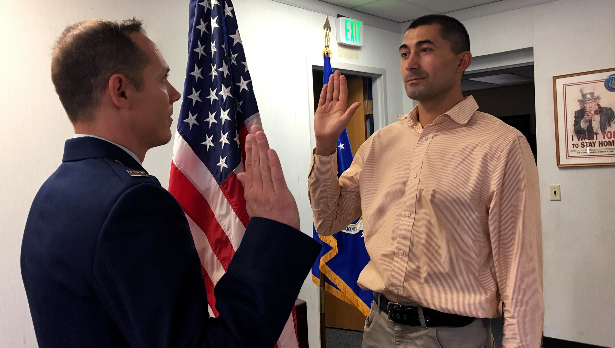 Stephan Pysariuk, originally from Ukraine, is sworn into the Air Force Reserve at Hill Air Force Base's recruiting office Sept. 29. Pysariuk has been assigned to the 419th Maintenance Squadron to work on F-35 aircraft.