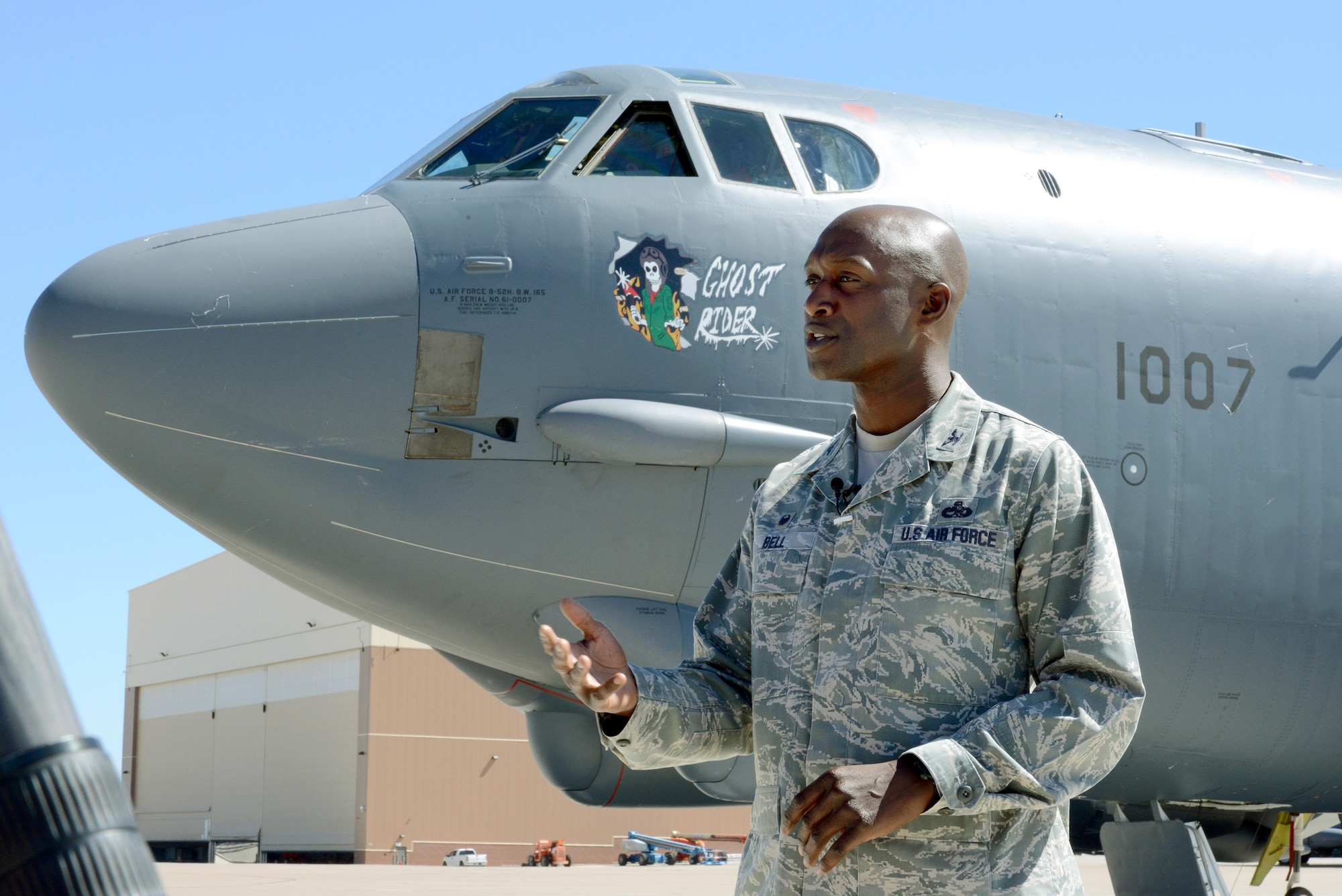 Col. Kenyon Bell, 76th Aircraft Maintenance Group commander, addresses the media Sept. 27, before “Ghost Rider” left Tinker Air Force Base for Minot AFB, N.D. “Ghost Rider,” a B-52H Stratofortress that was pulled from long-term storage at the 309th Aerospace Maintenance and Regeneration Group at Davis-Monthan AFB, Ariz., arrived at Tinker Air Force Base in December 2015. The historic aircraft spent the last nine months undergoing extensive repairs in programmed depot maintenance here. The work was completed 90 days ahead of schedule.  (Air Force photo by Kelly White)