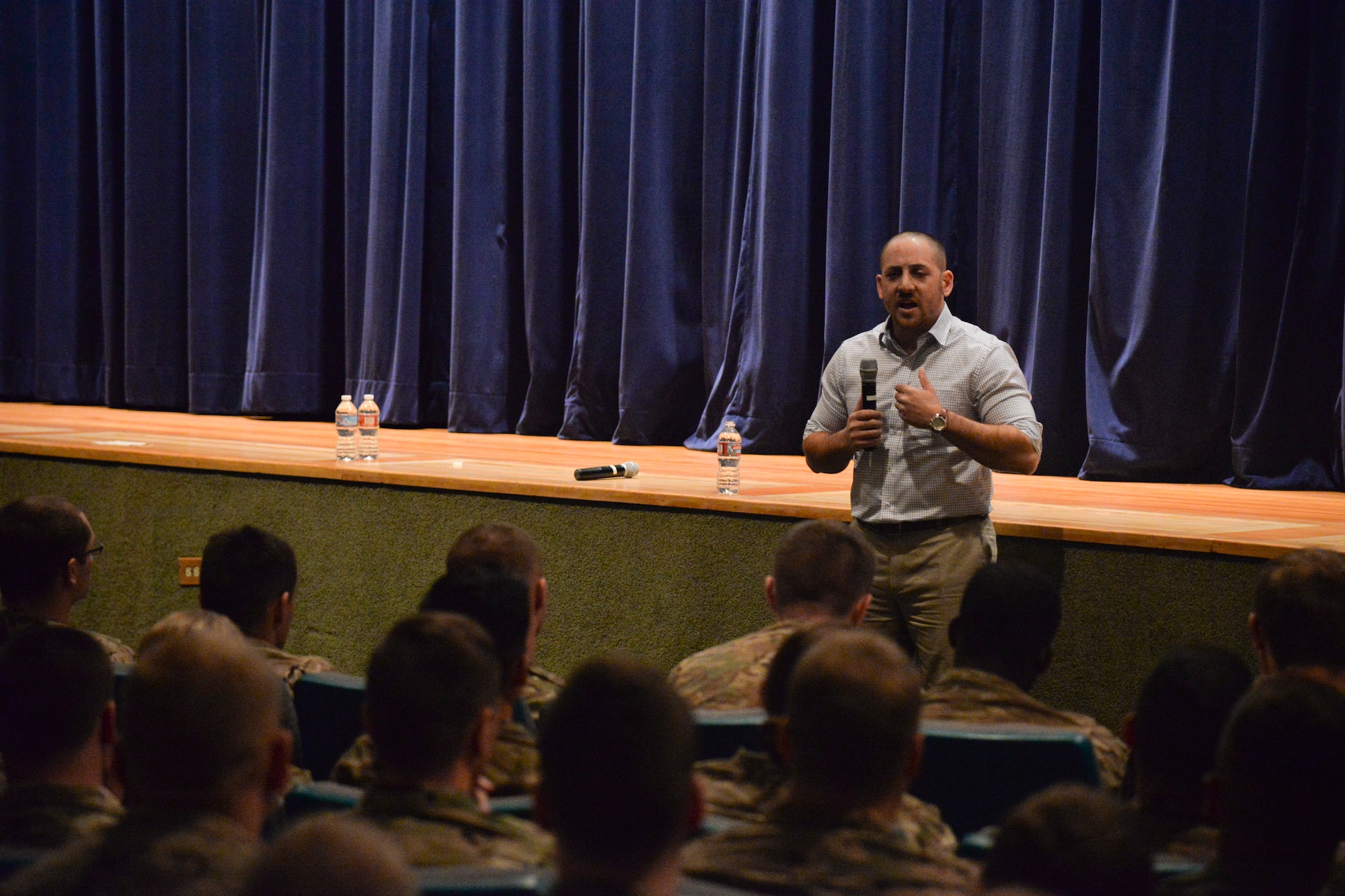 Kevin Hines, a mental health advocate, speaks to Airmen Sept. 28, 2016, at Malmstrom Air Force Base, Mont. Hines attempted to take his own life by jumping off the Golden Gate Bridge, but he survived. He now uses the experience to travel around the world to share his story in hopes to change the lives of others with brain illnesses and suicidal thoughts. (U.S. Air Force photo/Airman 1st Class Daniel Brosam)