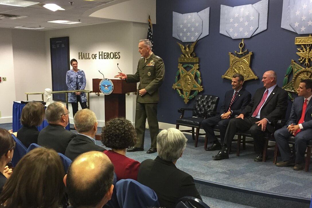 Marine Corps Gen. Joe Dunford, chairman of the Joint Chiefs of Staff, thanks the recipients of the 2016 Newman’s Own Awards at the Pentagon’s Hall of Heroes, Sept. 29, 2016. Five organizations received more than $200,000 in awards for providing unique opportunities for military personnel, their families and veterans. DoD photo by Jim Garamone