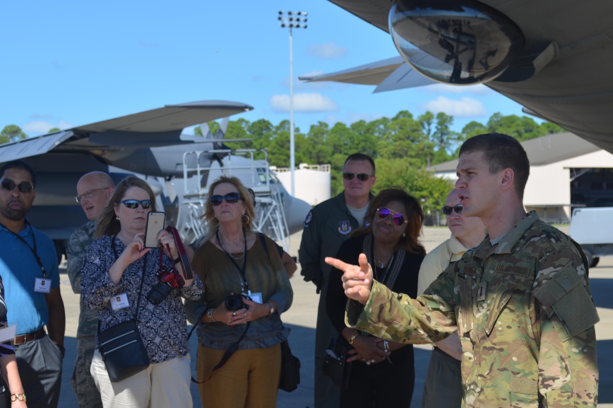 U.S. Air Force 1st Lt. Riley Feeney, assigned to the 4th Special Operations Squadron, briefs civic leaders from Barksdale Air Force Base, La. on the AC-130U Spooky at Hurlburt Field, Fla. Sept. 15, 2016. During the two-day trip, 27 civic leaders had the opportunity to get a closer look at the mission of the Air Force Reserve traveling from Barksdale AFB, La. on a KC-135 Stratotanker to Eglin AFB and Hurlburt Field, Fla. (U.S. Air Force photo by Master Sgt. Bianca Sellers-Brown/Released)