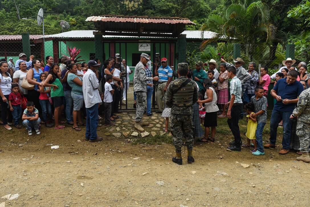 Members of the Joint Task Force-Bravo Joint Security Forces and Honduran military provide crowd control during a medical readiness training exercise, or MEDRETE, in the village of Bacadilla, Olancho district, Honduras, Sept. 23, 2016. The JSF and Honduran security personnel handled security issues throughout the two-day MEDRETE, and ensured the safety of the patients and the entire MEDEL team.