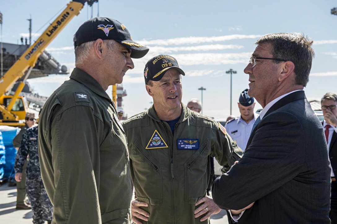 Defense Secretary Ash Carter speaks with Navy Vice Adm. Michael Shoemaker, commander of Naval Air Forces, and Navy Capt. Douglas Verissimo, commander of the USS Carl Vinson, aboard the ship in San Diego, Sept. 29, 2016. DoD photo by Air Force Tech. Sgt. Brigitte N. Brantley