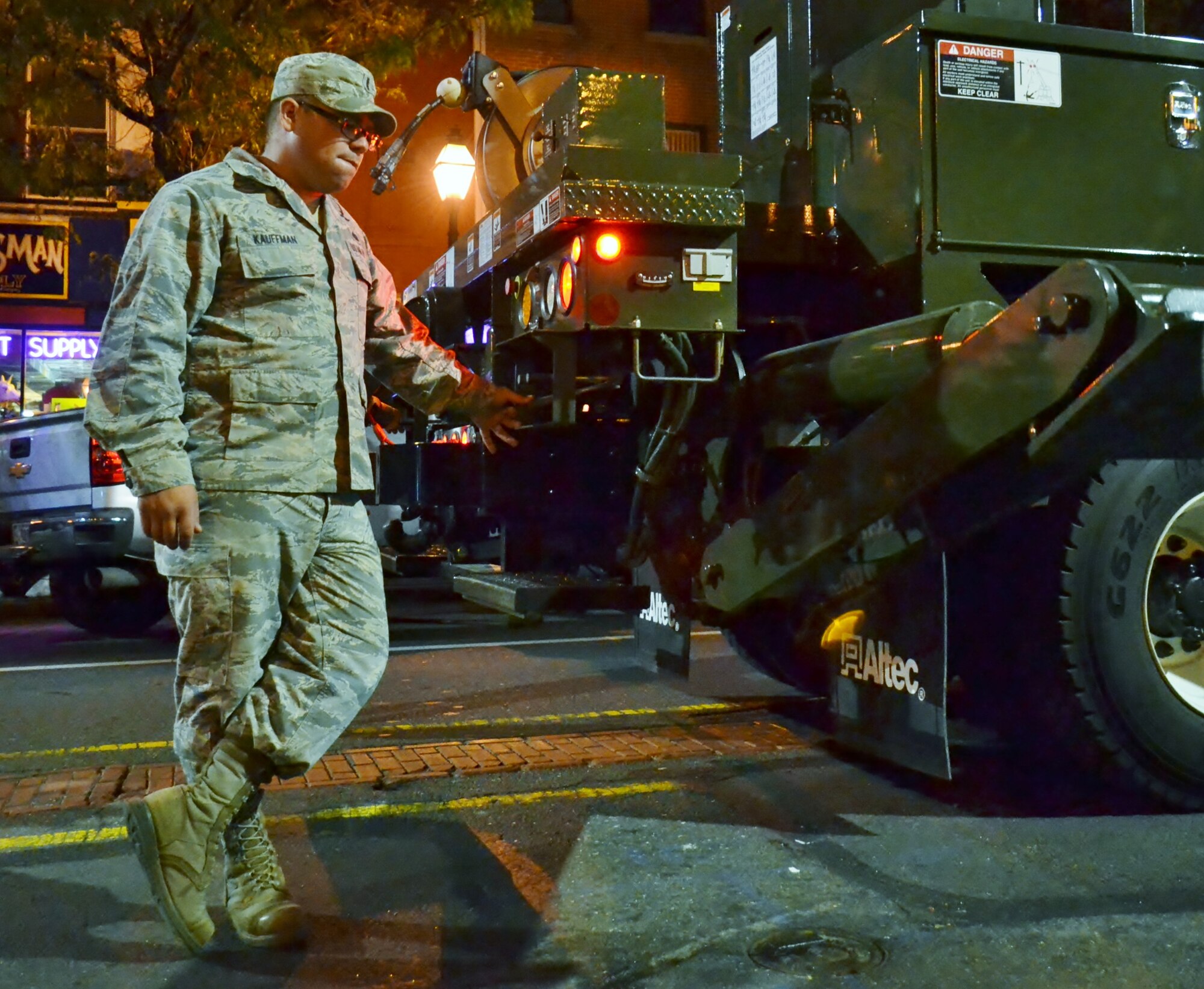 Air National Guard 1st Lt. Dakota Kauffman, 270th Engineering Installation Squadron project manager from Horsham Air Guard Station, Pa., proceeds with safety measures to secure a military vehicle in place to be used as a display for the FOX 29 Salutes the Military event Sept. 23, 2016 in center city Philadelphia. News anchors, reporters and staff from the FOX News affiliate spend nearly seven months preparing for the annual event that recognizes and thanks service members.(U.S. Air National Guard photo by Tech. Sgt. Andria Allmond) 