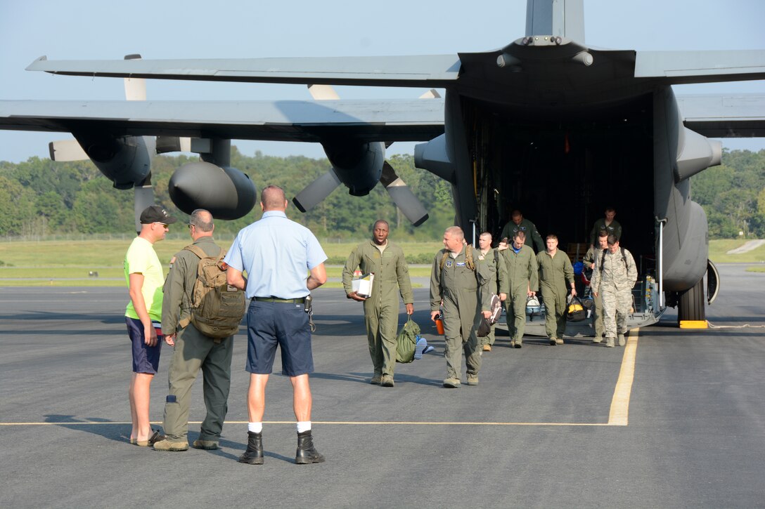 North Carolina Air National Guard (NCANG) members arrive at the Stanly County Airport M.W. Mullinix Terminal prior to attending an annual Water Survival Refresher Course held at Camp John J. Barnhardt in New London, NC, Sept. 9, 2016. The course is a one-day event run by the 145th Operations Support Squadron in an effort to train aircrew members on survival and rescue scenarios including but not limited to parachute water drags, life rafts, and essential equipment. (U.S. Air National Guard photo by Staff Sgt. Laura J. Montgomery/Released)