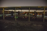 Australian soldiers, assigned to Task Group Taji, observe Iraqi soldiers with the Security Battalion, Nineveh Operations Command, firing their AK-47 rifles during night range training at Camp Taji, Iraq, April 3, 2016. Task Group Taji conducted night range training to gauge the Iraqi soldiers night firing capabilities. Training at the building partner capacity sites is an integral part of Combined Joint Task Force – Operation Inherent Resolve’s multinational effort to train Iraqi security force personnel to defeat the Islamic State of Iraq and the Levant. (U.S. Army Photo by Spc. William Lockwood)
