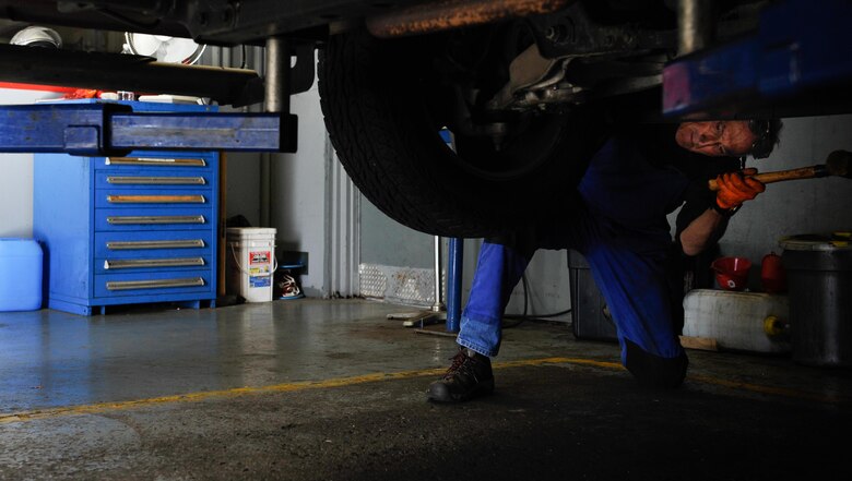 Greg Hermann, 86th Force Support Squadron tire technician, installs a winter tire on a customer’s truck Sept. 28, 2016, at Ramstein Air Base, Germany. According to the 86 AW safety office, cars should have winter tires from October to Easter. (U.S. Air force photo/Airman 1st Class Lane T. Plummer)