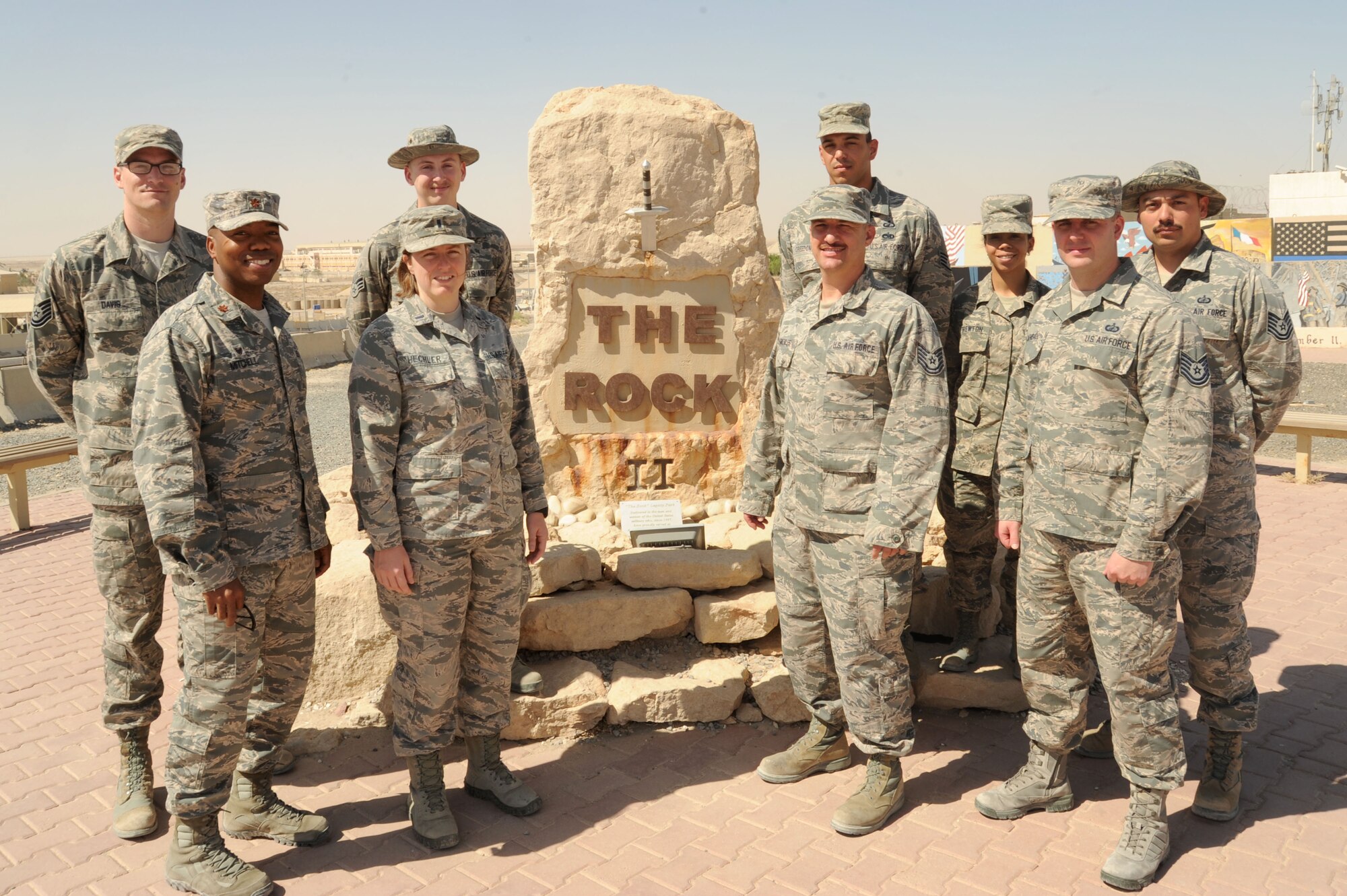 The 386th Expeditionary Contracting Squadron is made up of 11 contingency contracting officers, pictured here, who made it happen during the end of fiscal year 2016 at an undisclosed location in Southwest Asia. In the final month of FY16 alone, the 386 ECONS awarded an estimated $3.7 million and completed 93 contract actions that directly impacted Operation Inherent Resolve. (U.S. Air Force photo/Senior Airman Zachary Kee)