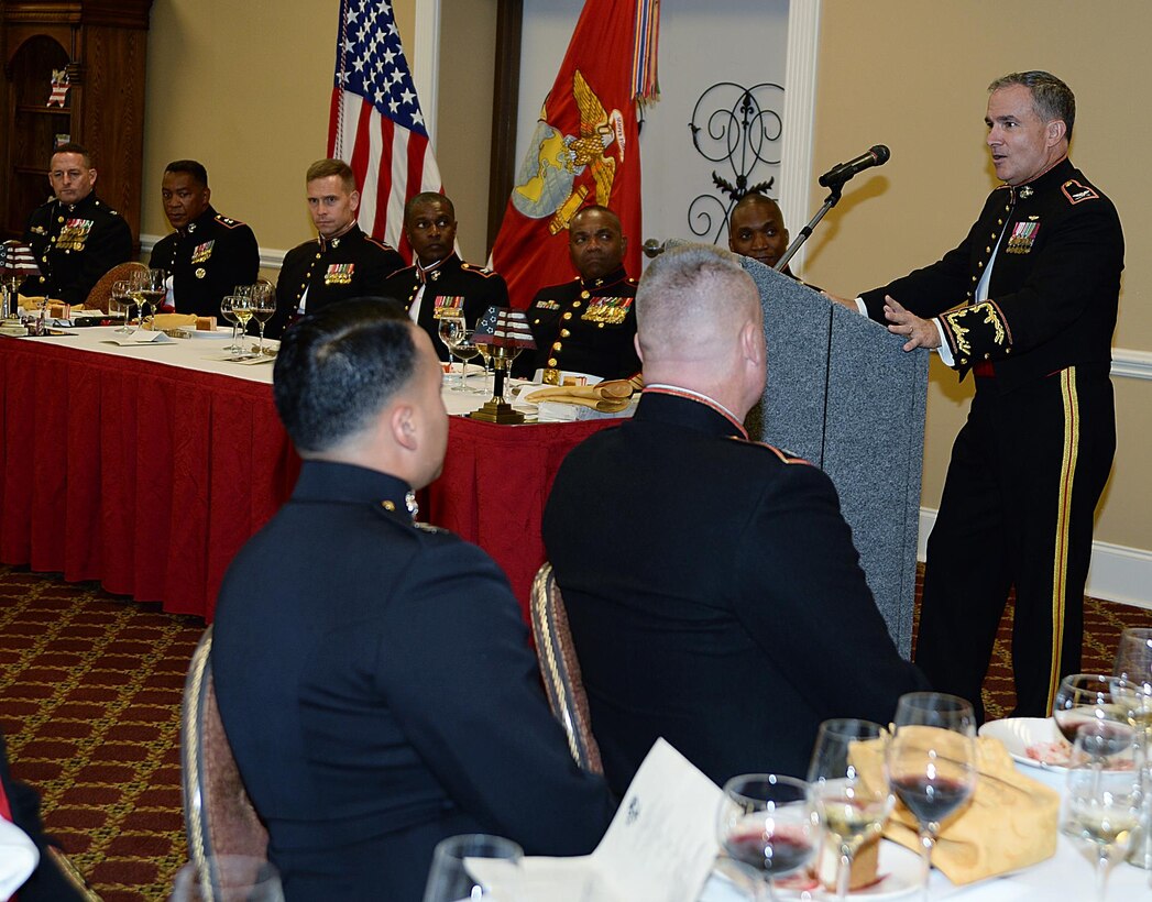 Retired Marine Col. Dan Gillan, (right) president and president and chief executive officer, Albany Area Young Men’s Christian Association, Albany, Ga., and the guest of honor at a recent mess night, spoke to the Marines about the importance of volunteerism at the Town and Country Grand Ballroom aboard Marine Corps Logistics Base Albany.  

