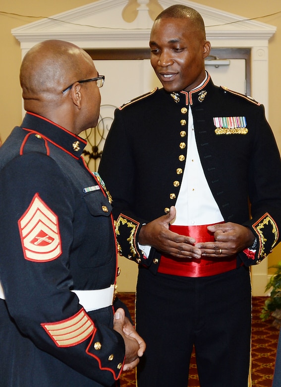 Lieutenant Col. Nathaniel K. Robinson, right, president of the mess, goes over the final details of the mess night with Gunnery Sgt. David Washington, vice president of the mess, at the Town and Country Grand Ballroom aboard Marine Corps Logistics Base Albany, recently.

