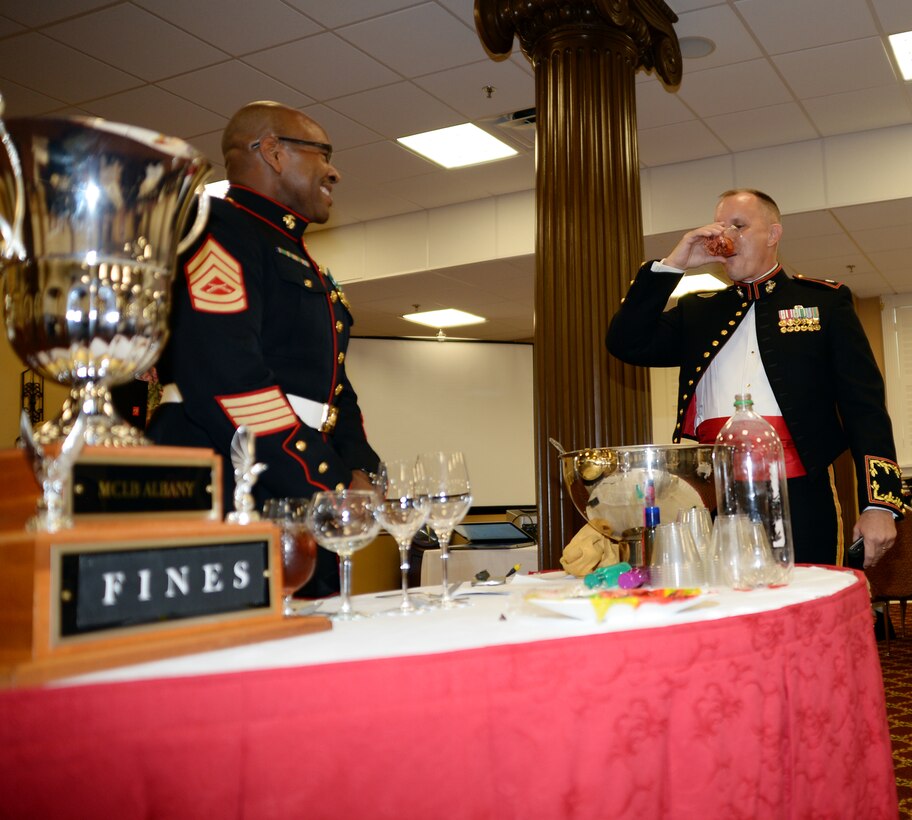 Marines bring attention to infractions, and sometimes false allegations, adding humor to a recent mess night held at Marine Corps Logistics Base Albany’s Town and Country Grand Ballroom.  Marines found guilty were charged to pay a small fine or take a drink from the “grog.”