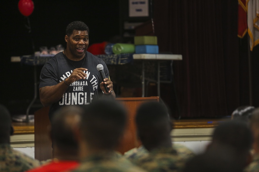 Heisman trophy winner and professional athlete, Herschel Walker, speaks at the Russell Marine and Family Center on Marine Corps Base Camp Lejeune as part of Building the Warrior Within, an interactive event focused on mental, emotional and physical fitness for Marines and Sailors, Sept. 21. Service members and civilians from across the Marine Corps Installations East community were in attendance for the event which was designed to equip them with tools to manage life’s stressors. (U.S. Marine Corps photo by Lance Cpl. Sean J. Berry)