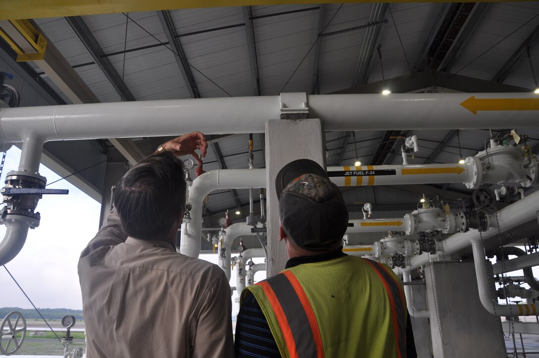 Hunter Army Airfield staff inspect piping in the newly-constructed pump house located on Fuel Island Sept. 27, 2016. Fuel system upgrades included 8,000 linear meters of piping. A final inspection was performed Sept. 28, 2016, by USACE project managers and construction representatives, Hawthorne Services, Inc. staff, and installation safety representatives and maintenance contractors before it was handed over to petroleum experts at Hawthorne Services.