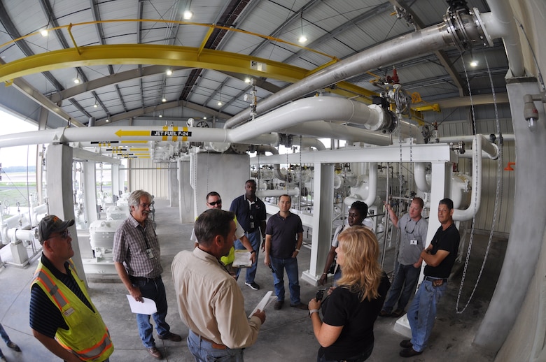 U.S. Army Corps of Engineers project managers and construction representatives, Hawthorne Services, Inc. staff, and installation safety representatives and maintenance contractors perform a final inspection of upgrades on Fuel Island at Hunter Army Airfield Sept. 27, 2016.