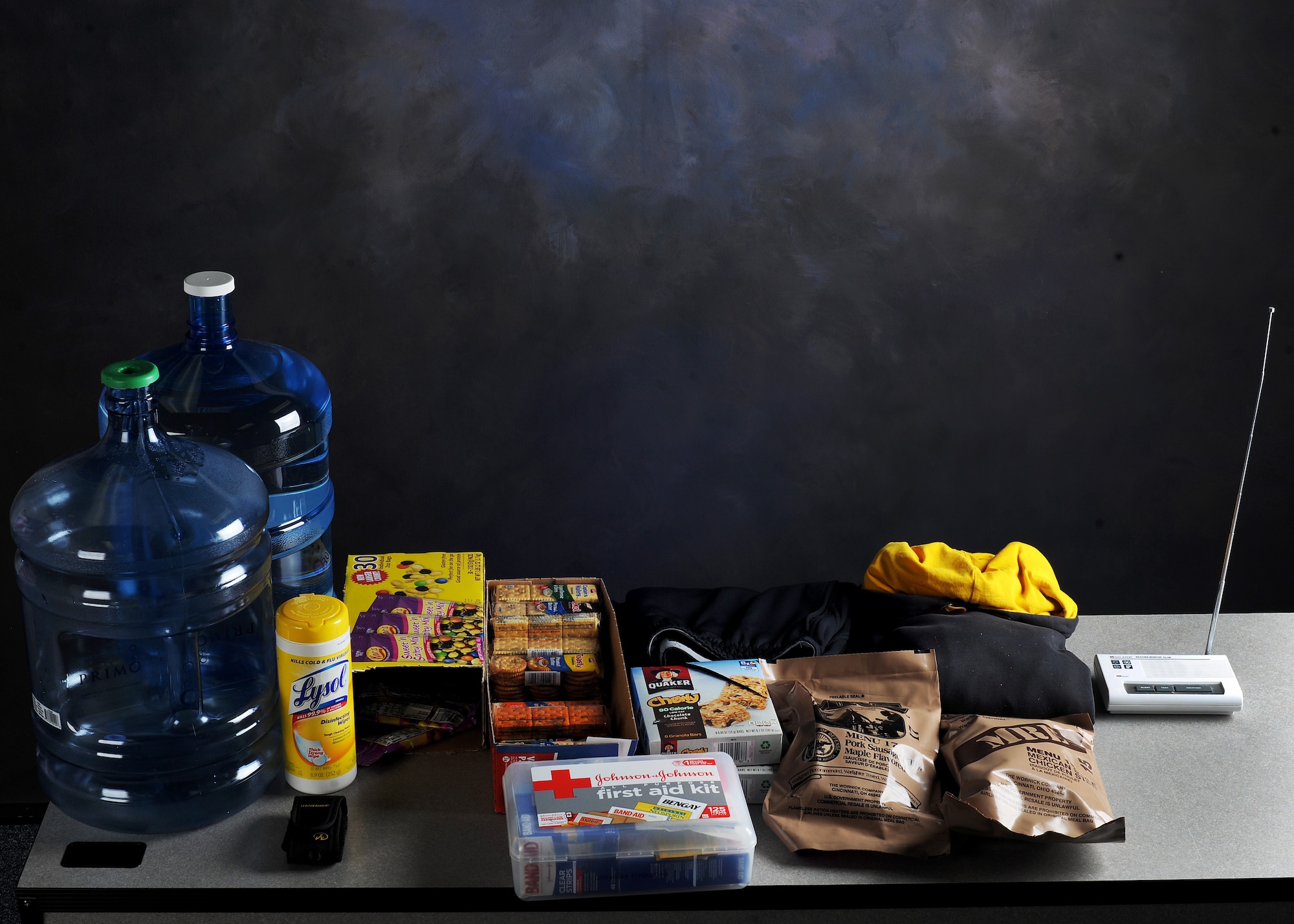 A sample emergency supply kit on Sept. 28, 2016, Altus Air Force Base, Okla. An emergency supply kit can help those facing a natural disaster by providing for basic human needs until emergency services arrive. (U.S. Air Force Photo by Airman Jackson N. Haddon/Released).