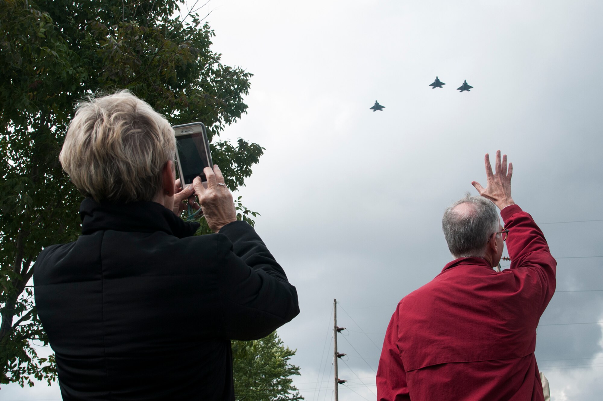 F-22 Raptors from the 27th Fighter Squadron perform a flyover in during a ceremony to honor a World War II veteran Tipton, Ind. Sept. 29, 2016. The ceremony was to honor Lt. Robert McIntosh, 27th Fighter Squadron pilot, whose remains were recently recovered. (U.S. Air Force photo/Staff Sgt. Dakota Bergl)