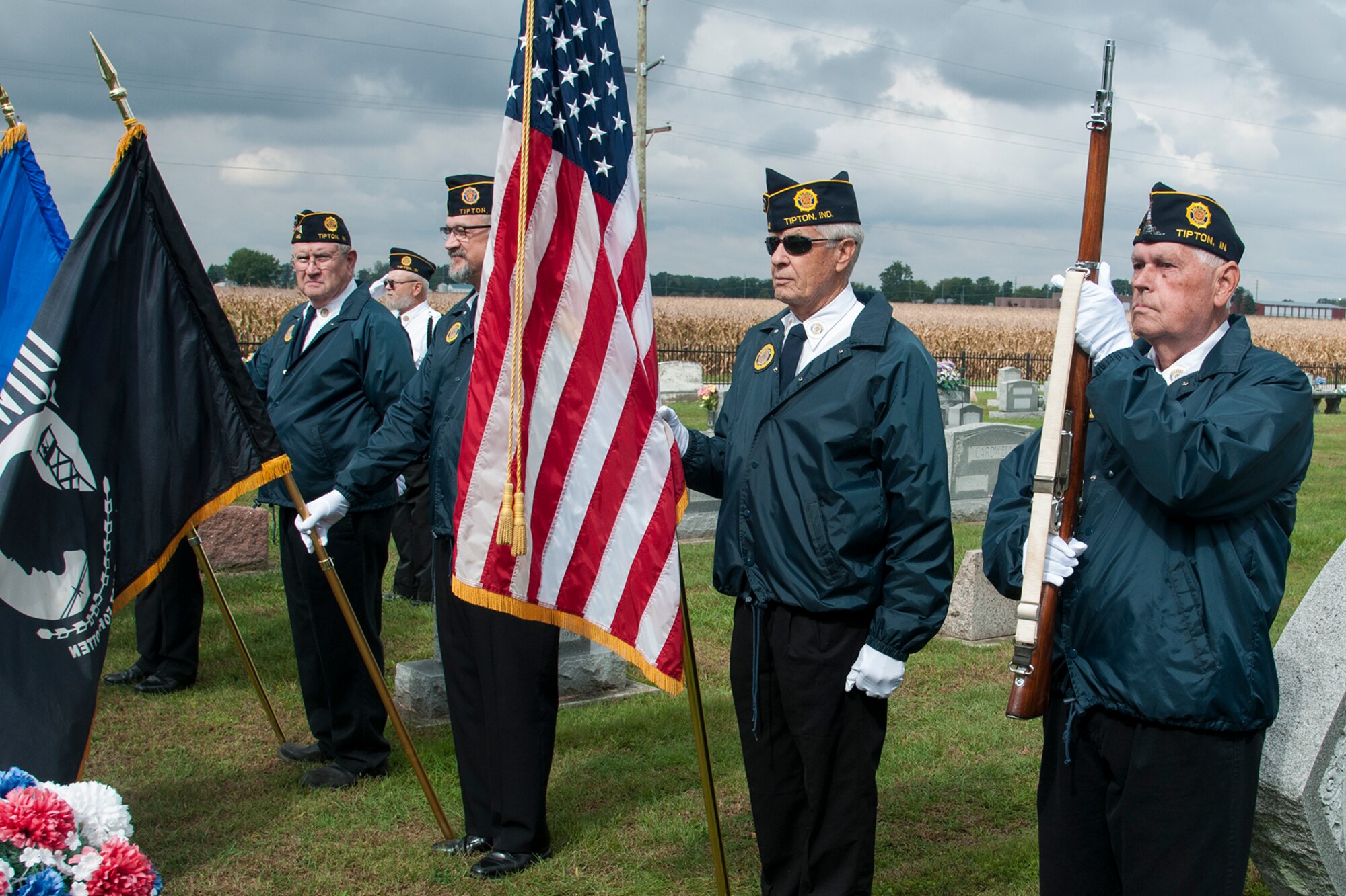 Members of American Legion Post 46 present arms during a ceremony to honor Army Air Corps Lt. Robert Mcintosh, 27th Fighter Squadron pilot, a World War II veteran in Tipton, Ind. Sept 29, 2106. McIntosh’s aircraft went down in Italy in 1942 and his remains were recently recovered. (U.S. Air Force photo/Staff Sgt. Dakota Bergl)