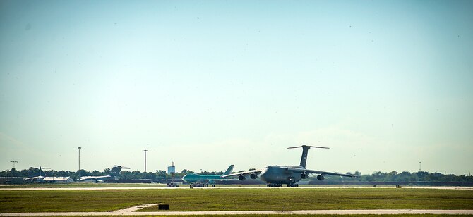 The final 433rd Airlift Wing C-5A Galaxy aircraft, tail number 70-0448, prepares to depart from Joint Base San Antonio-Lackland, Texas on Sept. 28, 2016. The Alamo Wing will receive eight C-5M Super Galaxy aircraft to support the U.S. Air Force's rapid global mobility mission.  (U.S. Air Force photo by Benjamin Faske) (U.S. Air Force photo by Benjamin Faske)