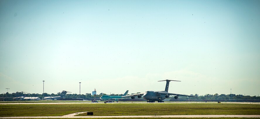 The final 433rd Airlift Wing C-5A Galaxy aircraft, tail number 70-0448, prepares to depart from Joint Base San Antonio-Lackland, Texas on Sept. 28, 2016. The Alamo Wing will receive eight C-5M Super Galaxy aircraft to support the U.S. Air Force's rapid global mobility mission.  (U.S. Air Force photo by Benjamin Faske) (U.S. Air Force photo by Benjamin Faske)